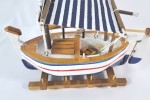 Llaut with decorative awning
